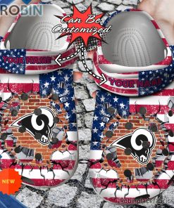 Football Crocs – Personalized Los Angeles Rams American Flag Breaking Wall Clog Shoes Football Crocs – Personalized Los Angeles Rams American Flag Breaking Wall Clog Shoes