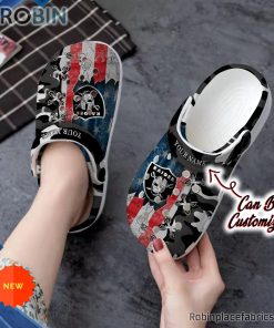 Football Crocs – Personalized Us Flag Las Vegas Raiders Cross Stitch Camo Pattern Clog Shoes