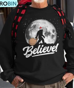 believe-santa-bigfoot-christmas-snow-amp-moon-night-graphic-ugly-christmas-sweatshirt-1