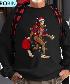 bigfoot-carrying-christmas-tree-sasquatch-pajama-ugly-christmas-sweatshirt-1