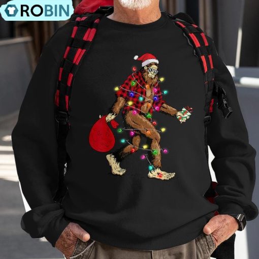 Bigfoot Carrying Christmas Tree Sasquatch Pajama Ugly Christmas Sweatshirt