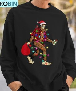bigfoot-carrying-christmas-tree-sasquatch-pajama-ugly-christmas-sweatshirt-3