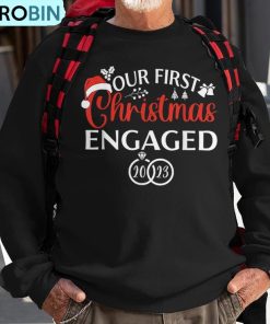 our-first-christmas-engaged-2023-christmas-couple-matching-ugly-christmas-sweatshirt-1