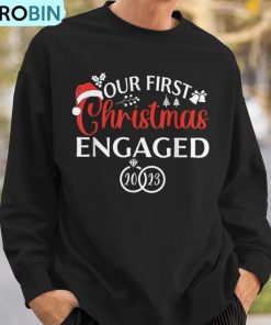 our-first-christmas-engaged-2023-christmas-couple-matching-ugly-christmas-sweatshirt-3
