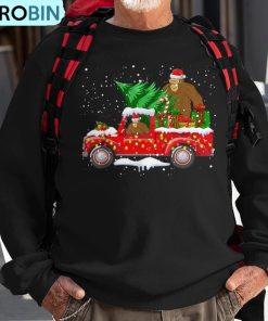 santa-bigfoot-riding-red-truck-amp-xmas-tree-merry-christmas-ugly-christmas-sweatshirt-1