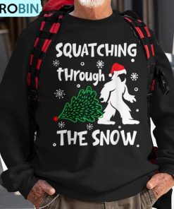 squatching-through-the-snow-christmas-sasquatch-santa-hat-ugly-christmas-sweatshirt-1