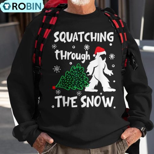 Squatching Through The Snow Christmas Sasquatch Santa Hat Ugly Christmas Sweatshirt