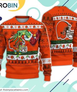 The Grinch Holding Cleveland Browns Design Ugly Christmas Sweater