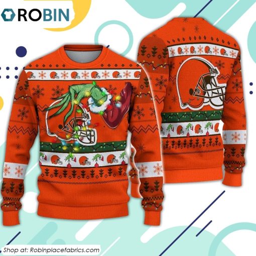 The Grinch Holding Cleveland Browns Design Ugly Christmas Sweater