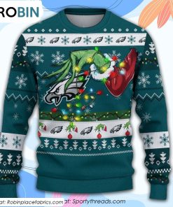 The Grinch Holding Philadelphia Eagles Design Ugly Christmas Sweater