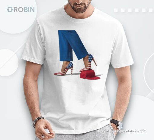 Kamala Harris With High Heels Stepping On Red Hat Unisex Shirt