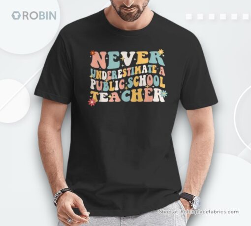 Groovy Never Underestimate A Public School Teacher Women Shirt
