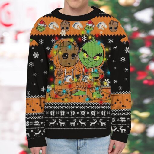NCAA UT Arlington Mavericks Baby Groot And Grinch Best Friends Ugly Christmas Sweatshirt & Sweater
