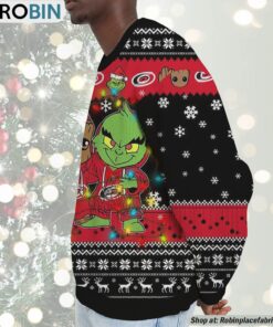 NHL Carolina Hurricanes Baby Groot And Grinch Best Friends Ugly Christmas Sweatshirt & Sweater NHL Carolina Hurricanes Baby Groot And Grinch Best Friends Ugly Christmas Sweatshirt & Sweater
