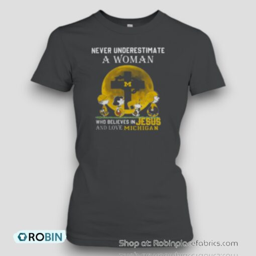 Peanuts Characters Never Underestimate A Woman Who Believes In Jesus And Loves Michigan Wolverines Unisex Shirt