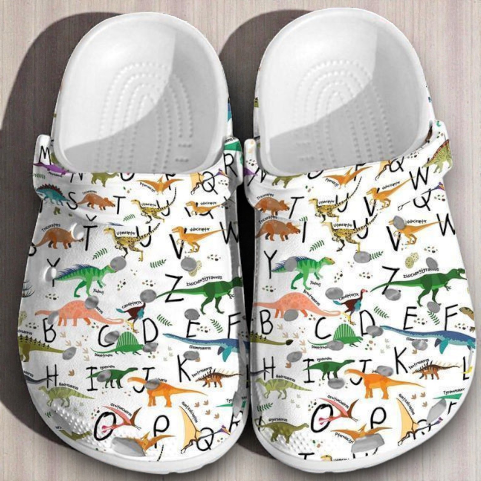 “Prehistoric ABCs” – Dinosaur Alphabet Learning Pattern Crocs “Prehistoric ABCs” – Dinosaur Alphabet Learning Pattern Crocs