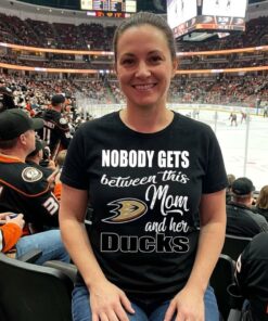 Nobody Gets Between Mom And Her Anaheim Ducks Unisex Shirt